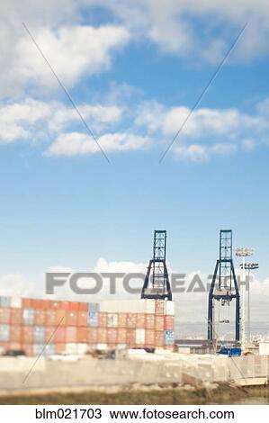 Cargo Containers and Loading Cranes View Large Photo Image Stock Image - Cargo Containers and Loading Cranes. Fotosearch