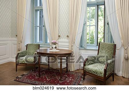 Stock Photo - Chairs Against the Windows. Fotosearch