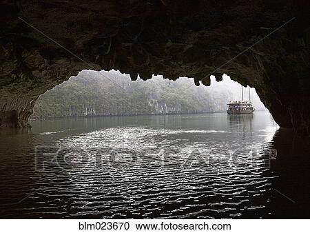 Chinese Junk Seen Through a Cave Entrance View Large Photo Image Stock Image - Chinese Junk Seen Through a Cave Entrance. Fotosearch