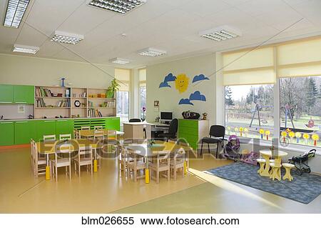 Stock Photography - Classroom, activity room with furniture, tables and chairs. Fotosearch
