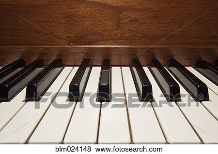 Stock Photo - Close up of piano keys. Fotosearch