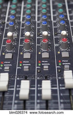 Close up of the mixing desk in the music department of a modern secondary school View Large Photo Image Picture - Close up of the mixing desk in the music department of a modern secondary school. Fotosearch