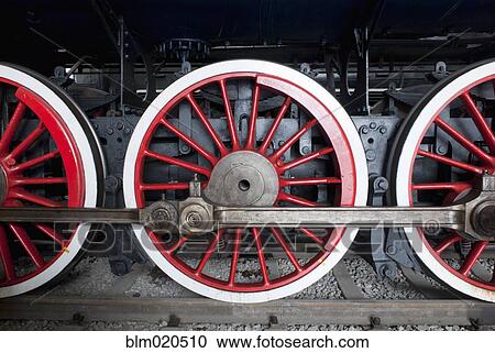 Close up of the rows of steel wheels of a locomotive train View Large Photo Image Stock Image - Close up of the rows of steel wheels of a locomotive train. Fotosearch
