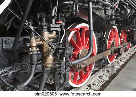 Close up of the rows of steel wheels of a locomotive train View Large Photo Image Stock Photography - Close up of the rows of steel wheels of a locomotive train. Fotosearch