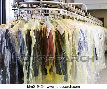 Clothing at Dry Cleaners View Large Photo Image Picture - Clothing at Dry Cleaners. Fotosearch
