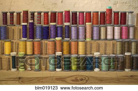Stock Image - Colored Sewing Thread. Fotosearch