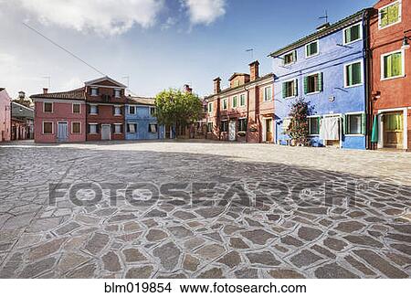 Colorful Homes Surround a Flagstone Plaza View Large Photo Image Picture - Colorful Homes Surround a Flagstone Plaza. Fotosearch