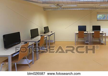 Computer room, desk and IT equipment View Large Photo Image Stock Photo - Computer room, desk and IT equipment. Fotosearch