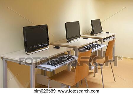 Computer room, desk and IT equipment View Large Photo Image Stock Photo - Computer room, desk and IT equipment. Fotosearch