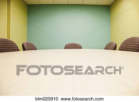 Stock Image - Conference Room Table and Chairs. Fotosearch