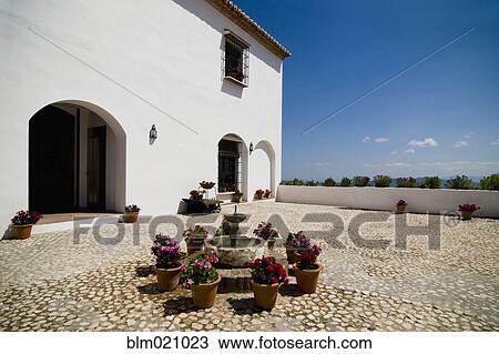 Stock Image - Courtyard of Hotel. Fotosearch