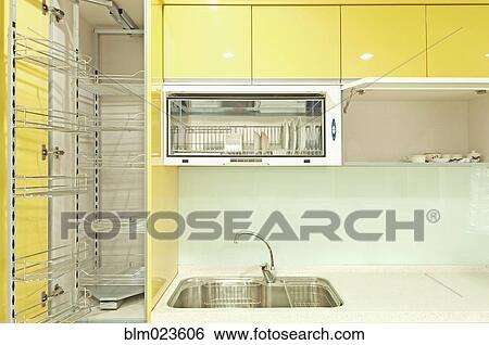 Cupboard with stainless steel metal racking View Large Photo Image Stock Photograph - Cupboard with stainless steel metal racking. Fotosearch