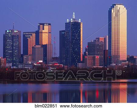 Stock Image - Dallas Skyline Reflected in Pond at Dusk. Fotosearch