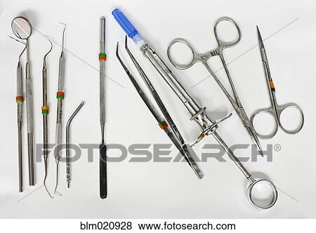 Dental Instruments on White Surface View Large Photo Image Stock Photo - Dental Instruments on White Surface. Fotosearch