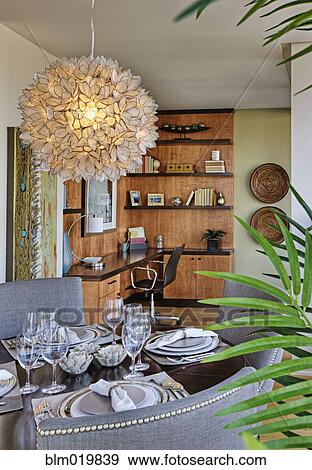 Stock Photo - Dining Room Interior With Ornate Light Fixture. Fotosearch