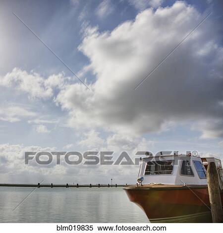Docked Boat and Sky View Large Photo Image Stock Photography - Docked Boat and Sky. Fotosearch