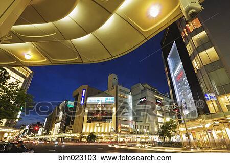 Stock Image - Downtown Street View at Dusk. Fotosearch