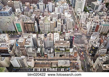 Stock Image - Downtown Tokyo skyline viewed from above. Fotosearch