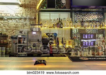 Drinks, coffee machine and cigarettes in bar View Large Photo Image Stock Photo - Drinks, coffee machine and cigarettes in bar. Fotosearch