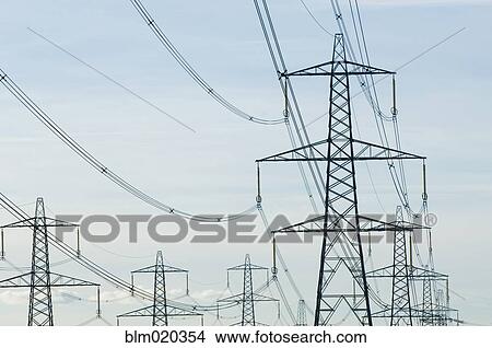 Picture - Electricity pylons against a clear blue sky, Clackmannanshire. Fotosearch