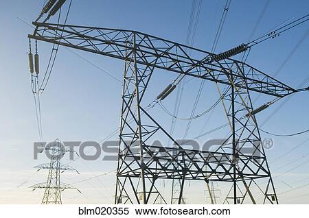 Electricity pylons against a clear blue sky, Clackmannanshire View Large Photo Image Stock Photography - Electricity pylons against a clear blue sky, Clackmannanshire. Fotosearch