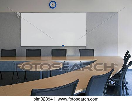 Stock Image - Empty boardroom or meeting room in an office. Fotosearch