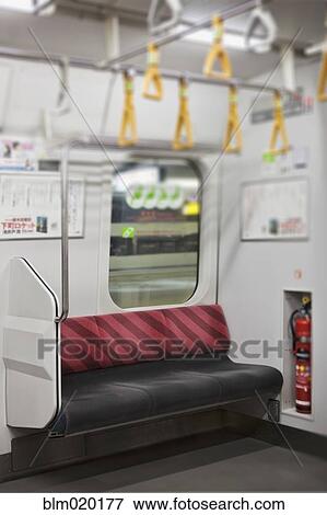 Empty seat on subway train, Tokyo, Japan View Large Photo Image Stock Photo - Empty seat on subway train, Tokyo, Japan. Fotosearch
