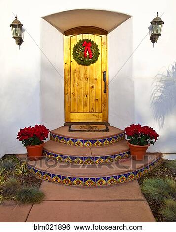 Stock Photograph - Entrance to Home with Holiday Decorations. Fotosearch