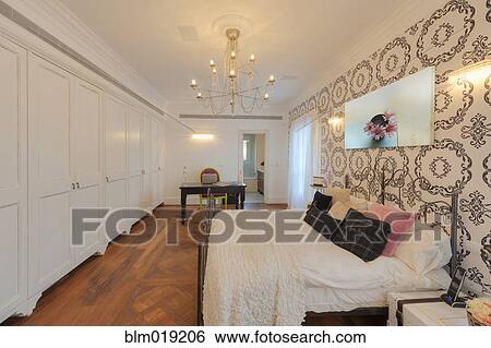 Stock Photograph - Feminine Decorated Bedroom. Fotosearch