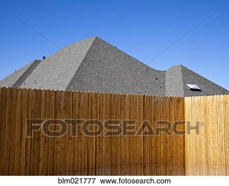 Stock Photo - Fence and Roof. Fotosearch