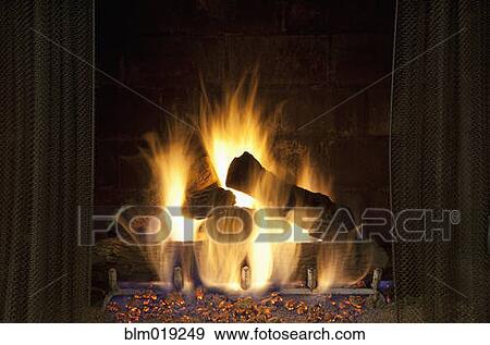 Fire in the fireplace hearth View Large Photo Image Stock Photo - Fire in the fireplace hearth. Fotosearch
