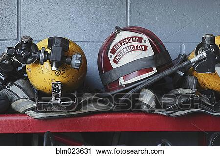 Stock Image - Fireman Helmets and Gear. Fotosearch