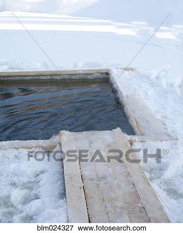 Stock Photo - Fishing Ice Hole. Fotosearch