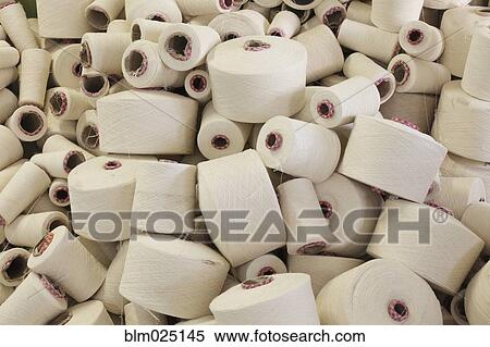 Stock Photography - Flax Spools in Bulk. Fotosearch