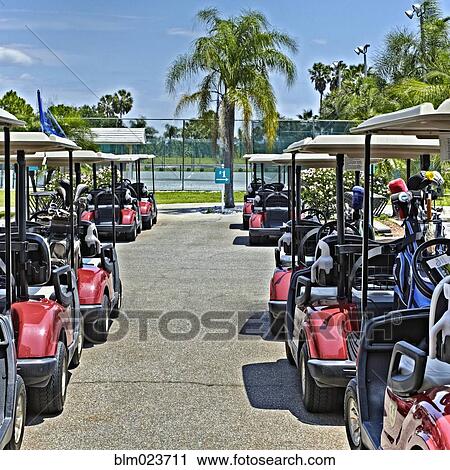 Stock Image - Fleet of Golf Carts. Fotosearch