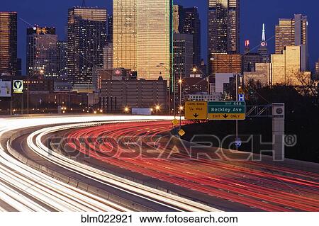 Stock Image - Freeway Traffic at Dusk on I-30. Fotosearch
