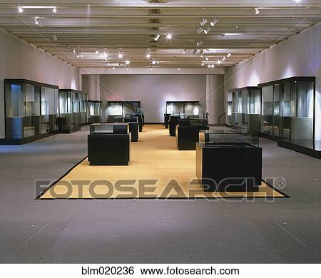 Gallery space and podium during installation of an exhibition View Large Photo Image Stock Photograph - Gallery space and podium during installation of an exhibition. Fotosearch