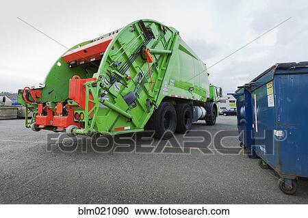 Garbage Truck Parked In A Parking Lot View Large Photo Image Stock Image - Garbage Truck Parked In A Parking Lot. Fotosearch