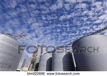 Grain Storage Containers View Large Photo Image Stock Photograph - Grain Storage Containers. Fotosearch