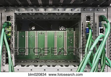 Picture - Green Cables and Computer Server. Fotosearch