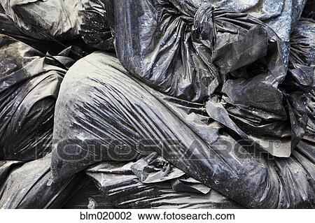 Heap of black garbage sacks View Large Photo Image Stock Image - Heap of black garbage sacks . Fotosearch
