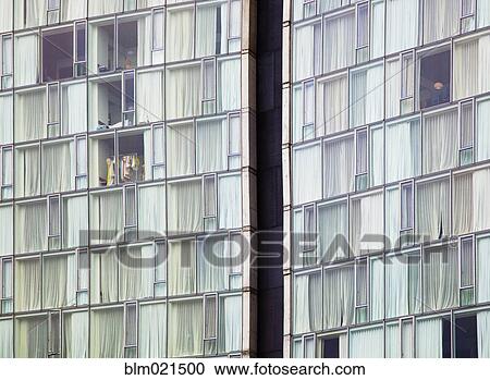 Stock Image - High-rise Hotel Windows. Fotosearch