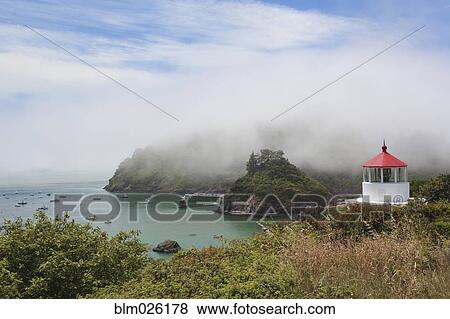 Historic Memorial Lighthouse is on the coast of Trinidad Cove in Patricks Point State Park View Large Photo Image Stock Photo - Historic Memorial Lighthouse is on the coast of Trinidad Cove in Patricks Point State Park. Fotosearch