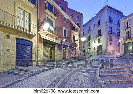 Historic old town in the center of Tarragona, with steep cobbled streets and old buildings View Large Photo Image Stock Photo - Historic old town in the center of Tarragona, with steep cobbled streets and old buildings. Fotosearch