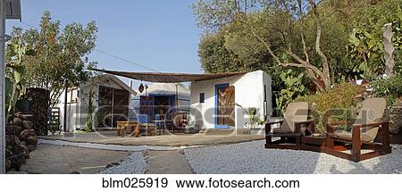 Holiday resort in Andalucia, with cactus and olive trees View Large Photo Image Stock Photo - Holiday resort in Andalucia, with cactus and olive trees. Fotosearch