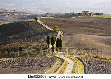 Stock Photo - Home in Isolated Landscape. Fotosearch