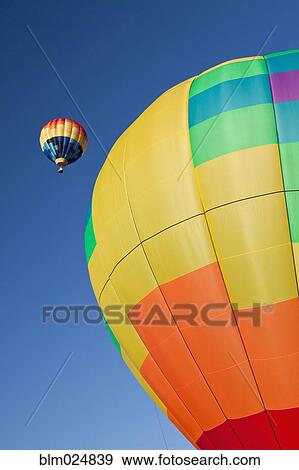 Stock Photo - Hot Air Balloon In Flight. Fotosearch