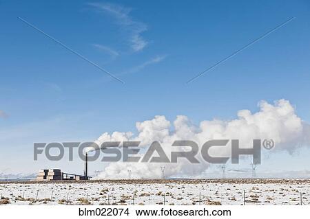 Industrial Complex and Snowy Landscape Under Blue Sky View Large Photo Image Picture - Industrial Complex and Snowy Landscape Under Blue Sky. Fotosearch