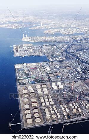Stock Image - Industrial Plants on Bay. Fotosearch