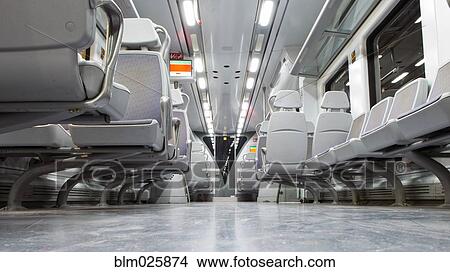 Interior of a modern train at night View Large Photo Image Picture - Interior of a modern train at night. Fotosearch